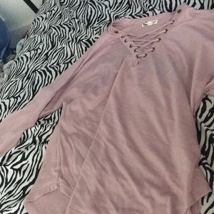 Pink long sleeve shirt with cross detailing